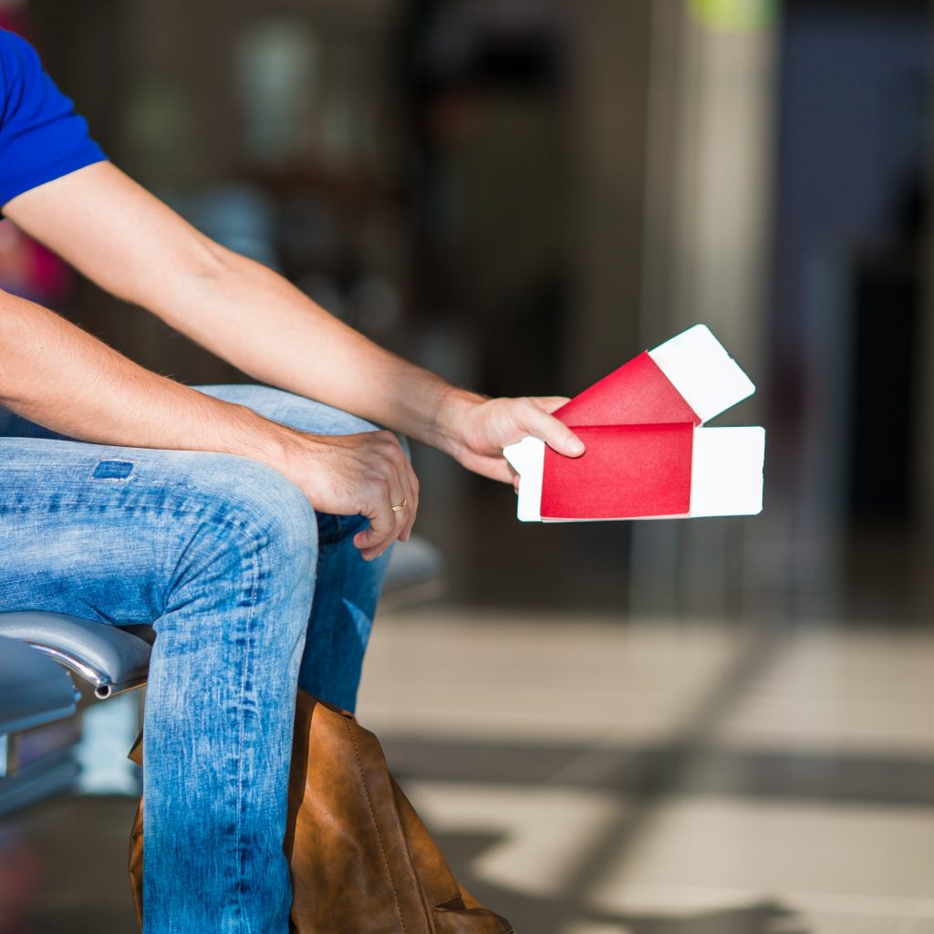 Closeup passports and boarding pass at airport indoor